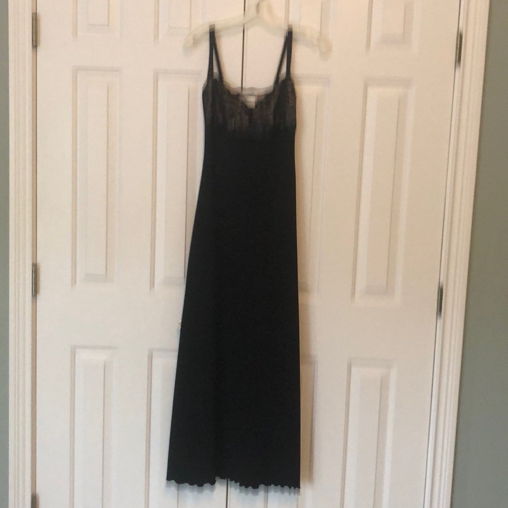 Lacy black, floor length ball gown.